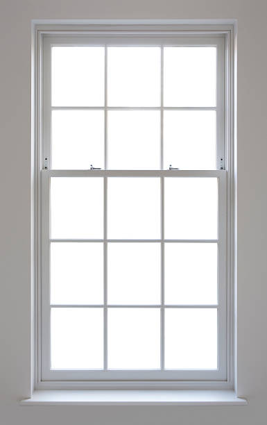 white Georgian window with clipping path a white painted wood construction Georgian style sash window. This is an extremely high quality window. The window panes have been blanked out and a clipping path has been carefully placed (including carefully tracing around the latches) to enable placement of an image in the background of your choice.Looking for a window Please see my window collection including cut-outs with clipping paths by clicking on the Lightbox Link below... window latch stock pictures, royalty-free photos & images
