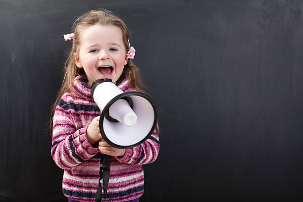 istock Cute girl in front of a chalkboard 175264654