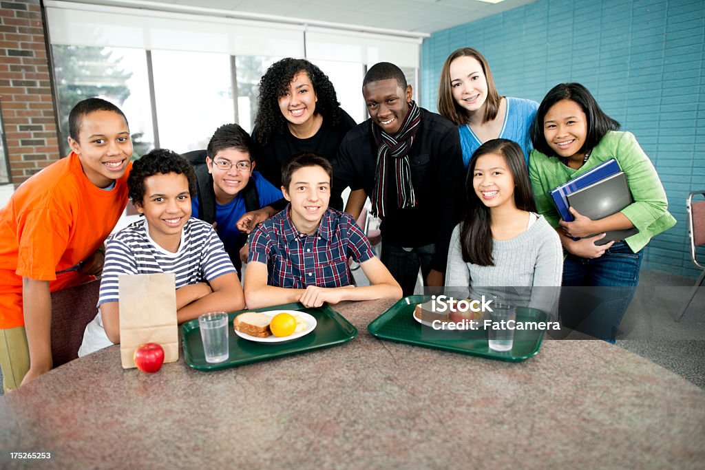Cafeteria High school students eating lunch in the cafeteria. Cafeteria Stock Photo