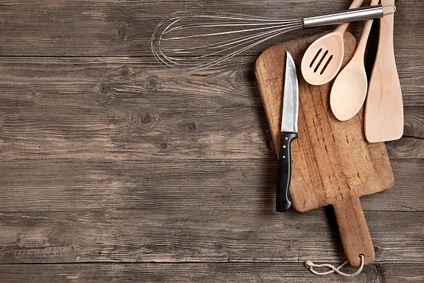 Photo of Kitchen utensils on wooden table