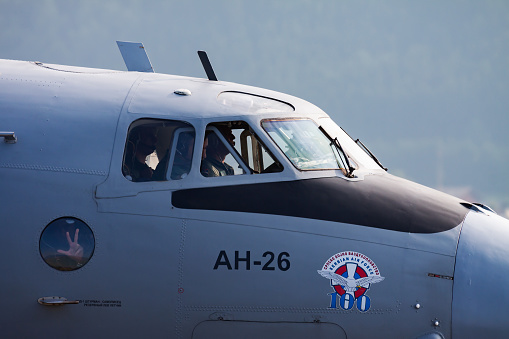 Zeltweg, Austria - June 28, 2013: Military transport plane at air base. Air force flight operation. Aviation and aircraft. Air defense. Military industry. Fly and flying.