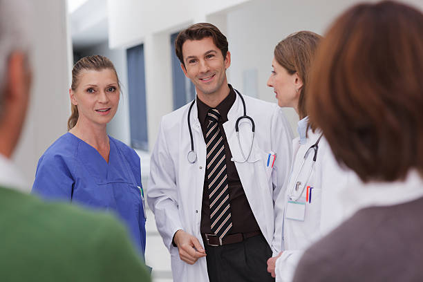 istock Medical team greeting patient 175267376