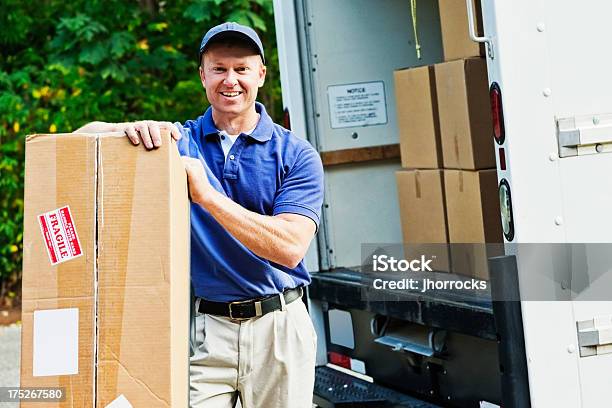 Delivery Man Stock Photo - Download Image Now - Fragile Sign, Fragility, Masculinity