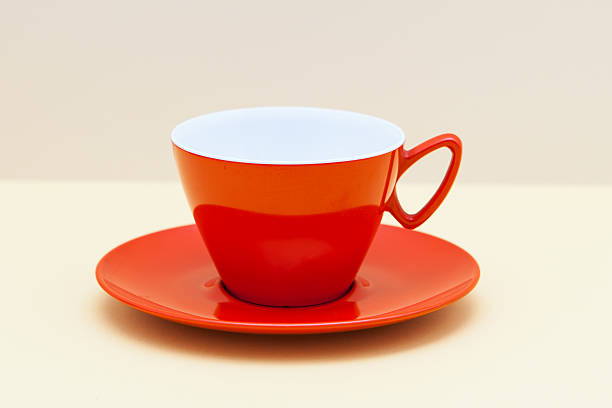 istock Vintage orange melamine cup and saucer for picnics 175267776