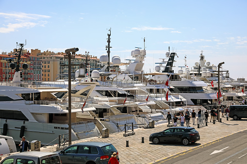 Nice, France - April 23, 2023: The port of Lymia, yachts are moored at the quay. We see these yachts from the stern side.