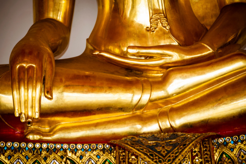 golden buddha hand detail