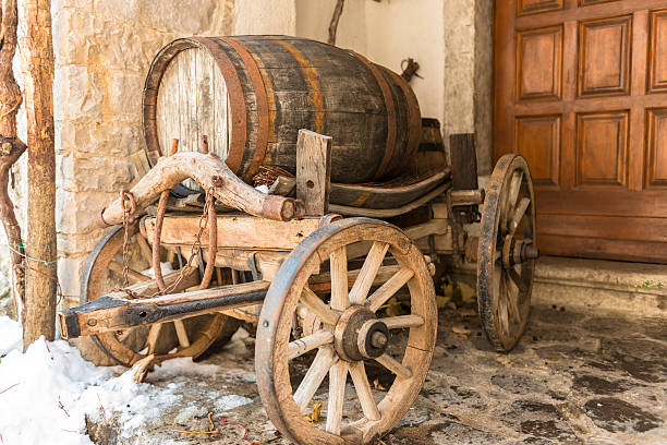 istock Wooden cart with wine barrel 175268044