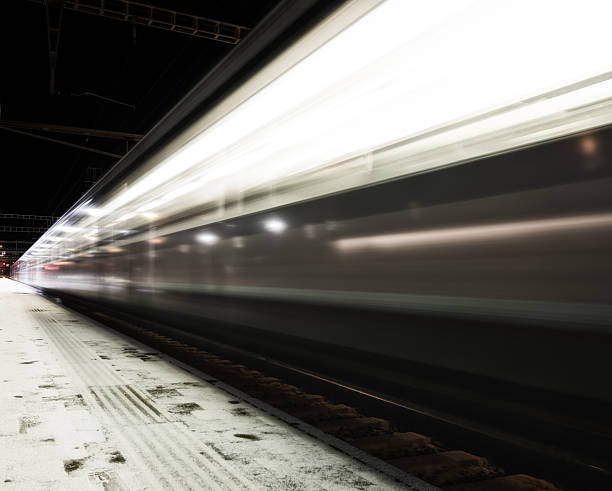 istock speed train moving at high velocity through trainstation 175269143