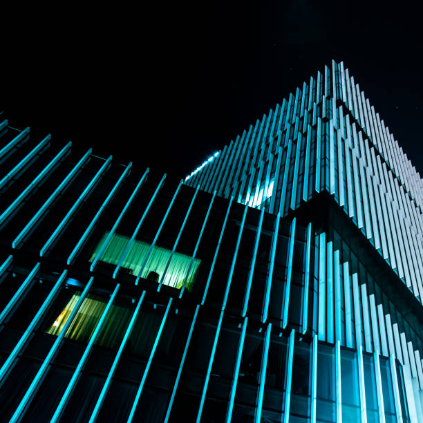 istock Modern business building facade at night. 1752698167