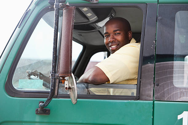istock Man driving truck 175270308