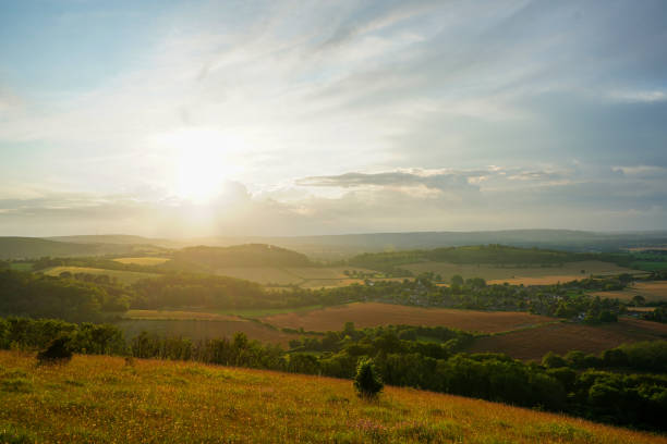 istock Looking at a sunset on countryside and farm fields 1752714968