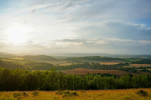 istock Looking at a sunset on countryside and farm fields 1752715515