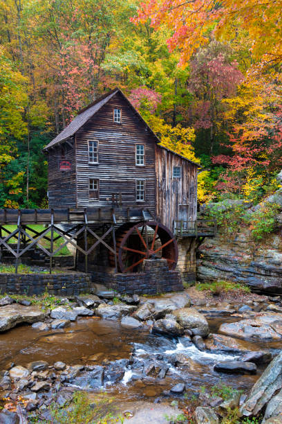 просека ручей grist mill - autumn watermill glade creek waterfall стоковые фото и изображения