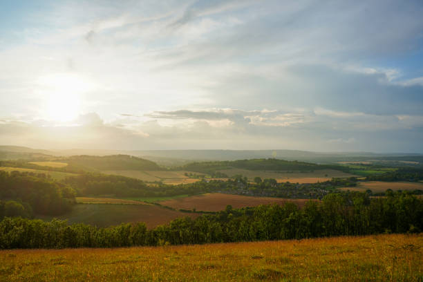 istock Looking at a sunset on countryside and farm fields 1752717143