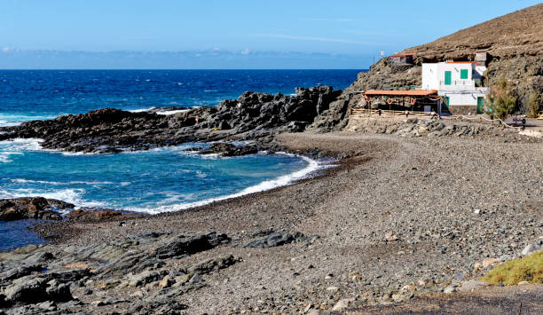 playa aguas verdes - fuerteventura, isole canarie, spagna - light sea low tide fuerteventura foto e immagini stock