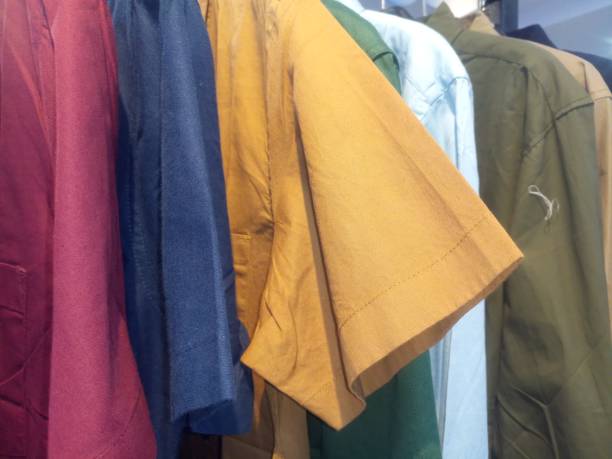 istock clothes neatly lined up on hangers 1752750671
