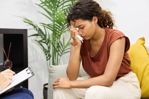 istock Depressed Hispanic woman crying on therapy 1752862899
