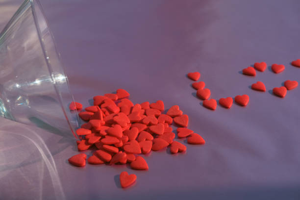 heart of pills on pink background, sweethearts valentine decoration