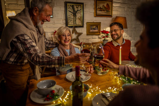 istock Family enjoying in Christmas dinner at home 1752874751