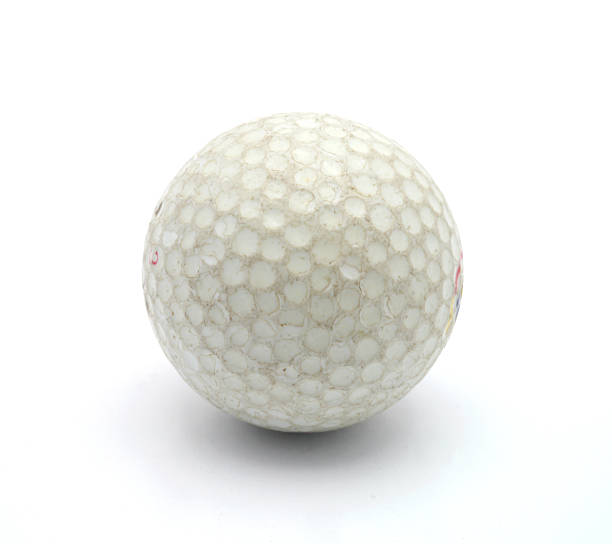 istock Old used golf ball isolated on white 175288075