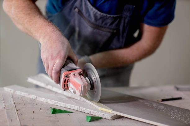 istock Close-up of tiler cutting ceramic tile for the floor or wall 1752880976