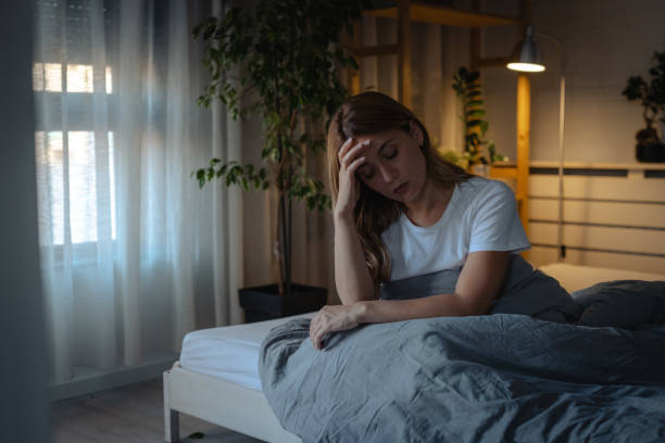 istock Mid adult woman suffering from insomnia 1752893348