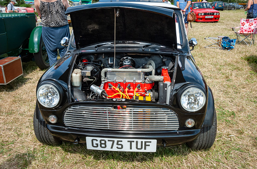 Front view of Black Rover Mini Cooper at Classic Car show and steam rally in: Herefordshire - United Kingdom, 26th July 2014