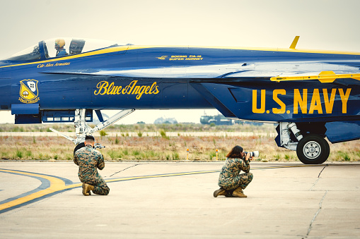 Miramar, California, USA - September 21, 2023: A pilot with the US Navy Blue Angels taxis in front of Marine Corps photographers at America's Airshow 2023.