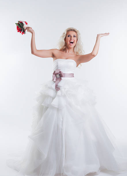 istock Cheerful model posing in elegant wedding dress 175293022