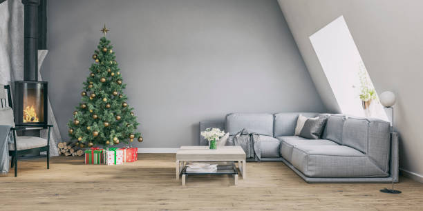 istock Attic apartment: a cozy, modern living room with a sloping wall, sofa, chairs, decorations and a decorated Christmas tree with gifts in the corner near the stove-fireplace 1752935583