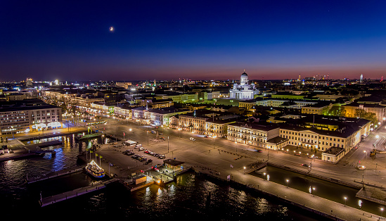 Quiet Helsinki by night. A  drone view to the city center, Market Square and Helsinki Cathedral