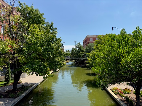 A view of a riverwalk that’s popular with tourists in the Bricktown neighborhood of Oklahoma City, Oklahoma, USA.