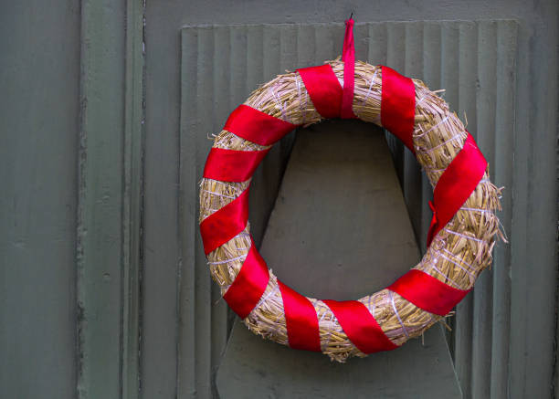 istock a Christmas wreath hangs on the door 1753072992