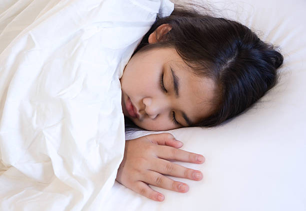 istock Cute girl sleeping on a white bed. 175309719