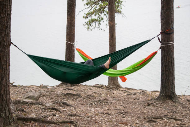 istock Relaxing in a hammock during hiking. Camping with a view. Sleeping in a hammock 1753123587