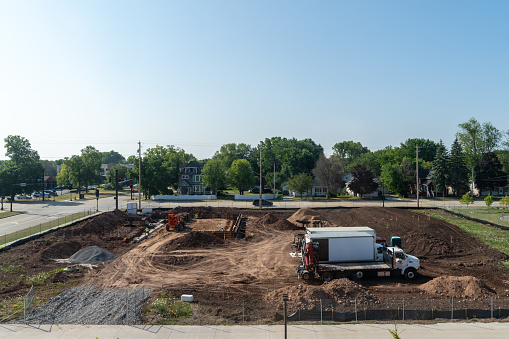 Oshkosh, Wisconsin - July 21, 2023: Construction site of a new business complex, being actively worked on during summer
