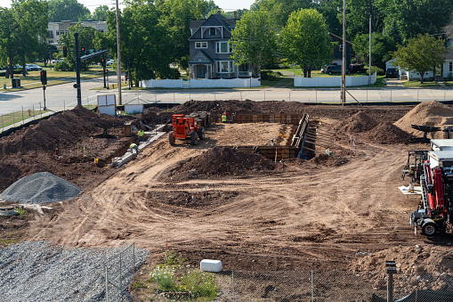 Oshkosh, Wisconsin - July 21, 2023: Construction site of a new business complex, being actively worked on during summer