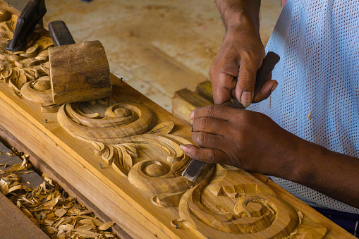 Wood craftsman comes from Jepara, Central Java, Indonesia