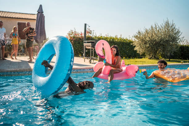 istock Diverse Friends Chilling on Pool Floats 1753196085