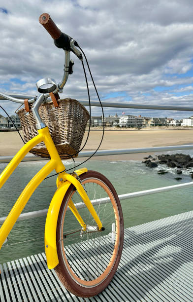 istock Yellow Bicycle on Pier Overlooking Asbury Park, NJ Beach 1753197293