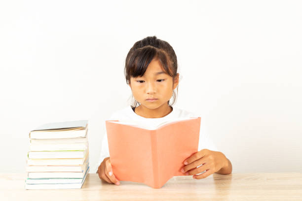 istock A girl reading in her room. 1753202293