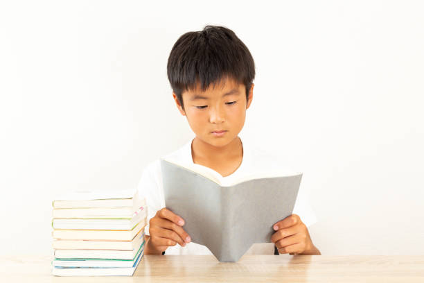 istock A boy reading in his room. 1753202864