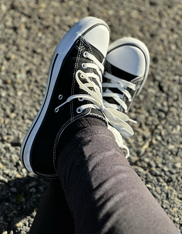 Black Sneakers, White Laces, and Black Jeans, Gray Asphalt