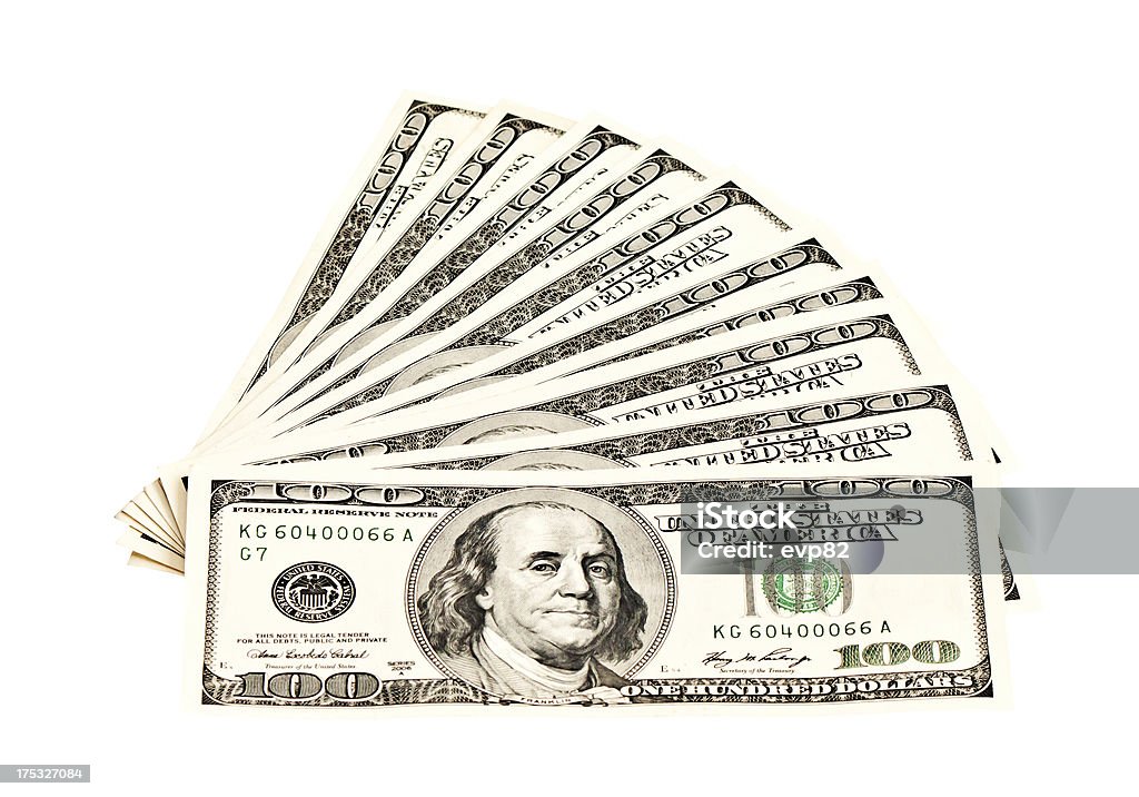 Heap of 100 dollar banknotes isolated on white Heap of 100 dollar banknotes isolated on white. One Thousand Dollar Bill Stock Photo