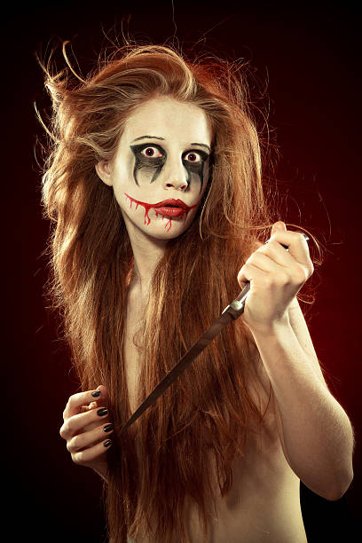 istock Evil woman with knife 175327451