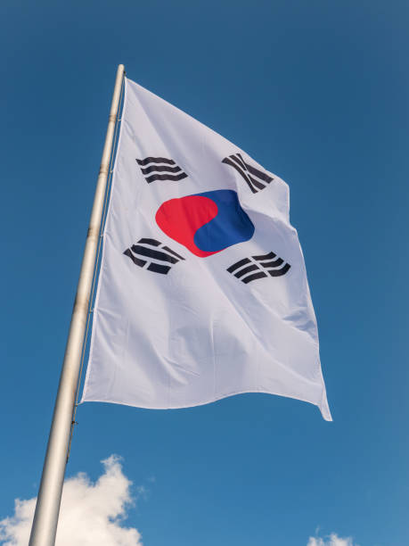 istock South Korean Flag Backlit Against Blue Sky - Low-Angle View 1753296237