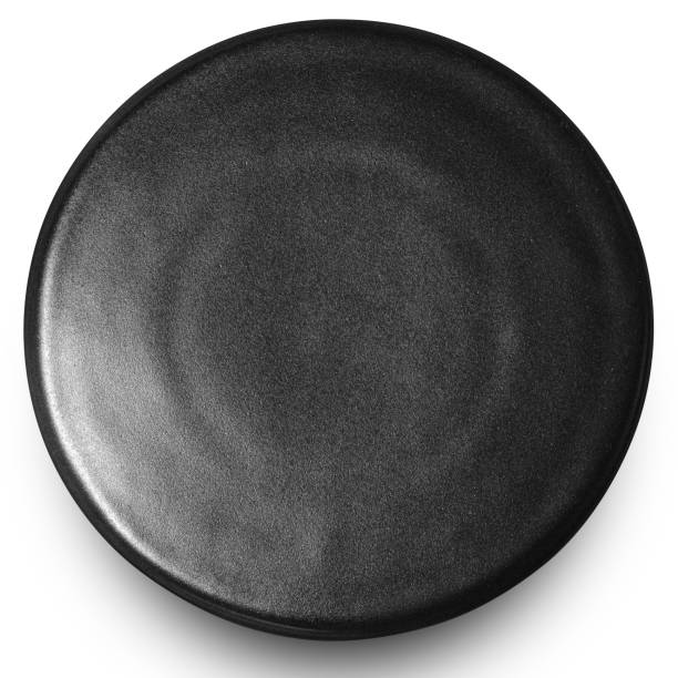istock Black circle ceramics plate isolated on white background. 1753311556