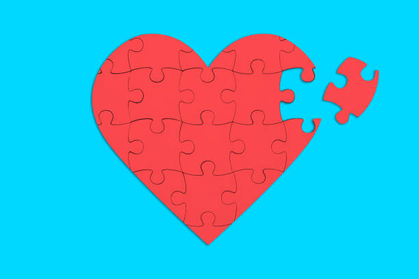 istock Uncomplete heart shape jigsaw puzzle, love emotional concept 1753320180