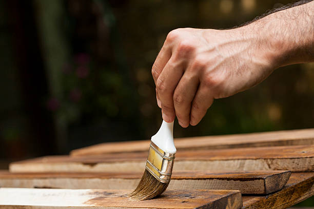 istock Man painting the fence 175337640