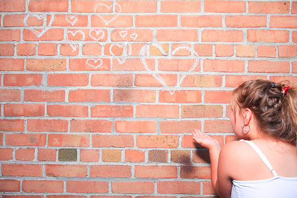 istock Girl Blow Love Heart Brick 175339236
